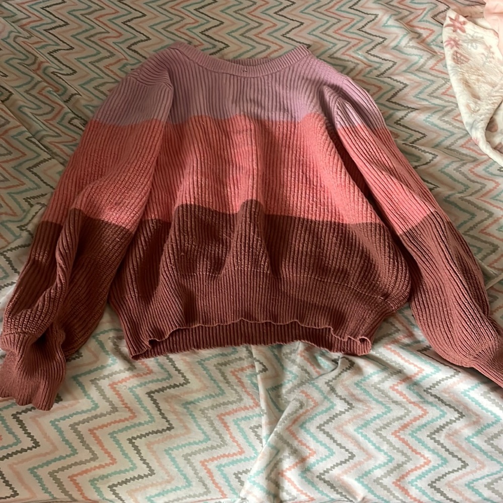 purple, salmon, and brown sweater